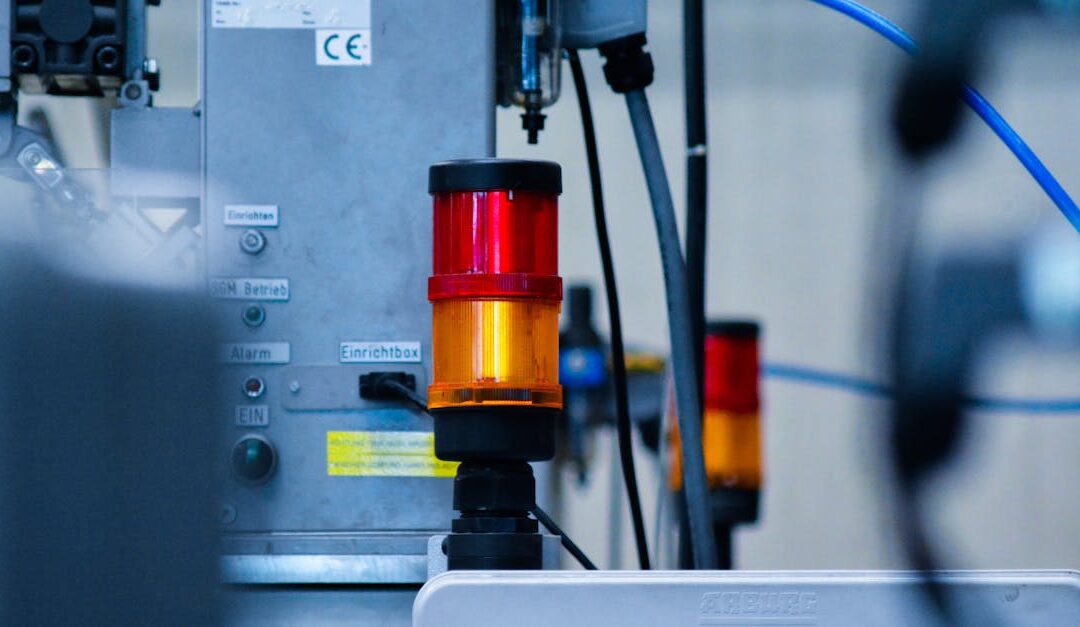 Detailed view of automated machinery with warning signals in an industrial setting.