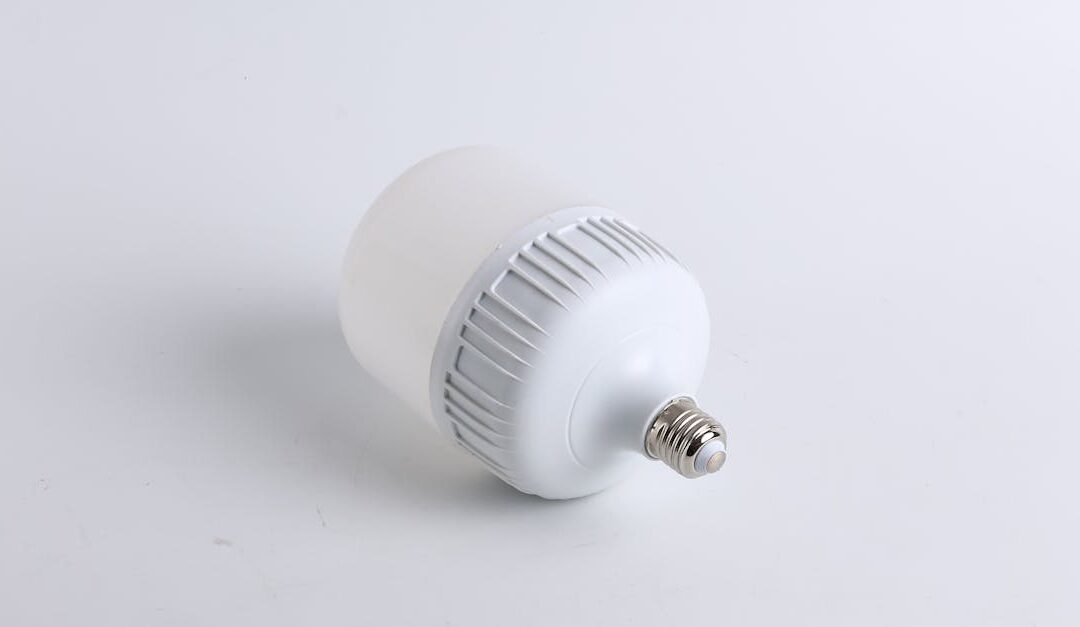 Close-up of a single LED light bulb on a plain white background, showcasing its design.