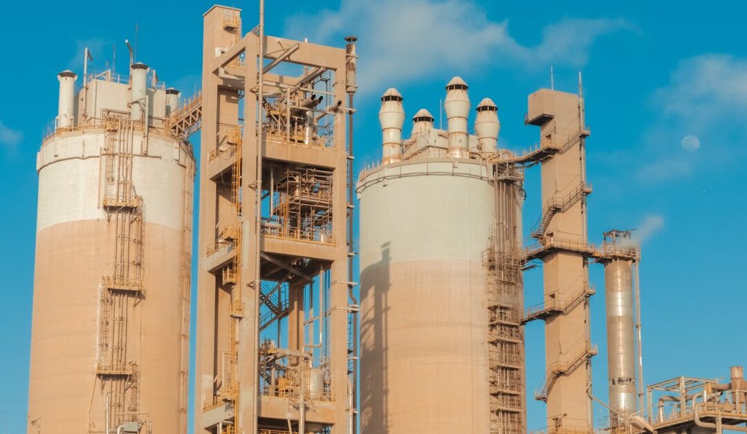 A view of urea towers at an industrial plant in Libya, captured on a clear day.