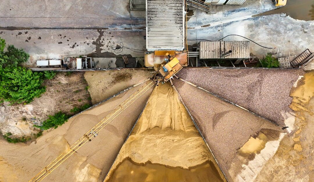 Aerial shot of sand and gravel processing plant in operation.