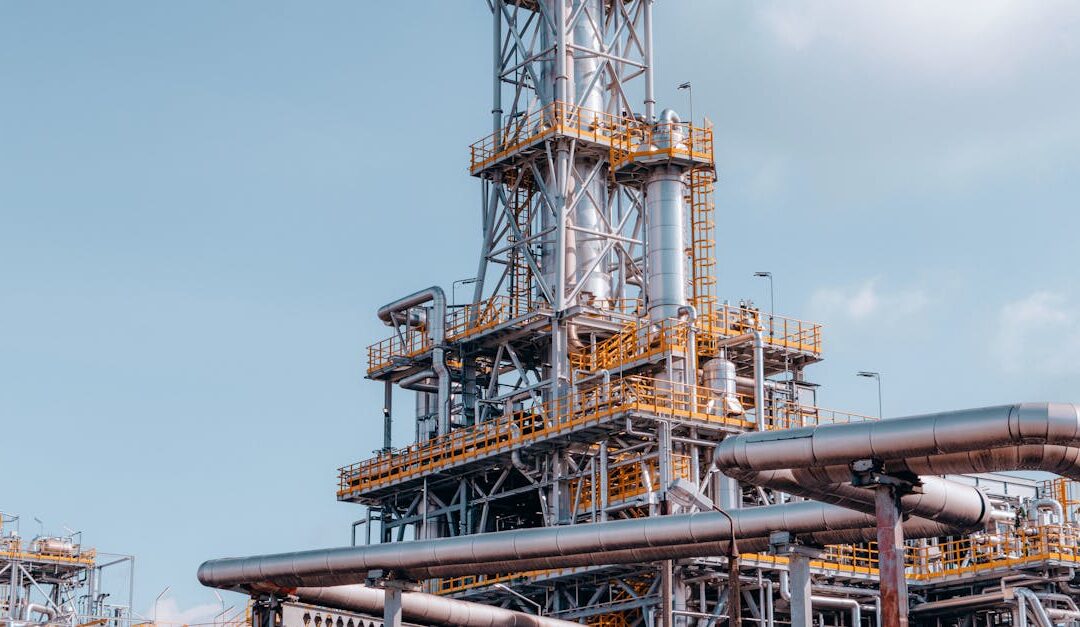 View of a large oil refinery plant with intricate pipelines in Trzebinia, Poland.